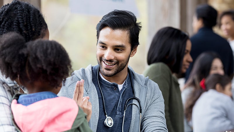 Non-profit healthcare worker helping in relief efforts.