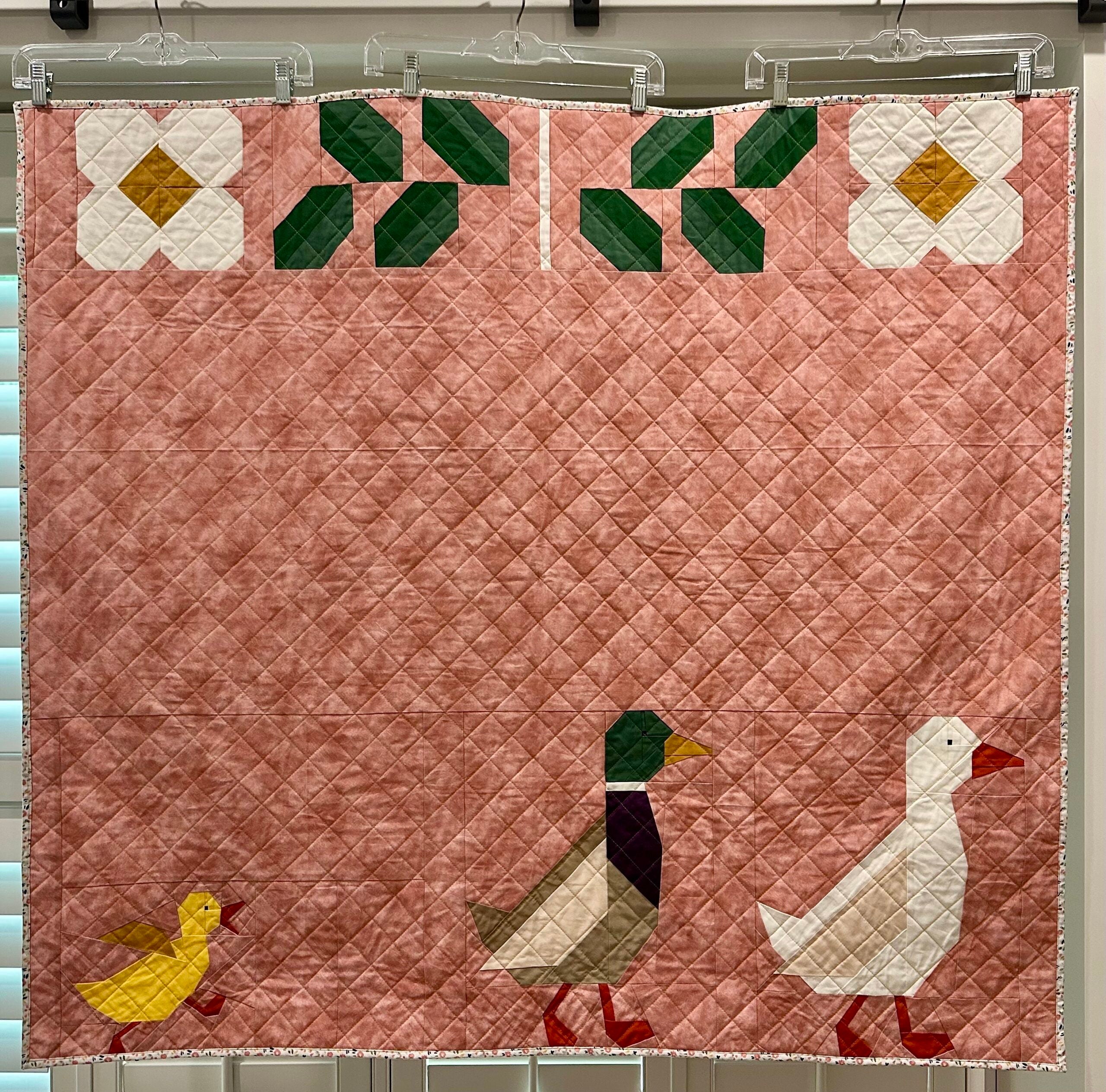 A quilt with ducks